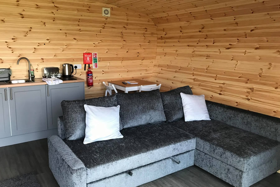 Open-plan living area inside The Cothi Pod