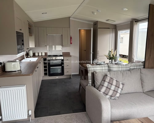 Fully equipped kitchen inside Elms 26 static caravan