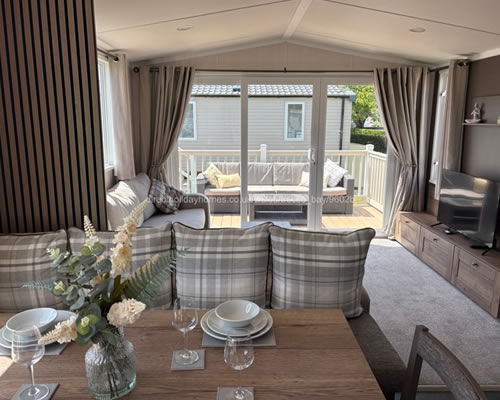 Spacious open-plan lounge inside Elms 26