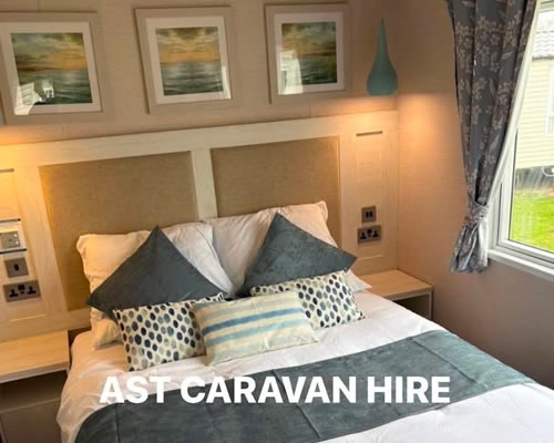 Master bedroom with television and en-suite at Goscar 45