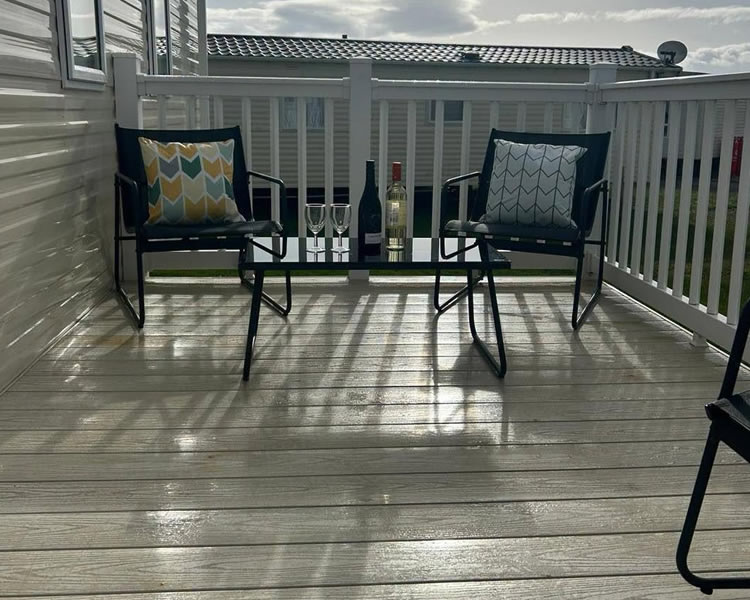 Enclosed front deck and side decking at Poplars Caravan