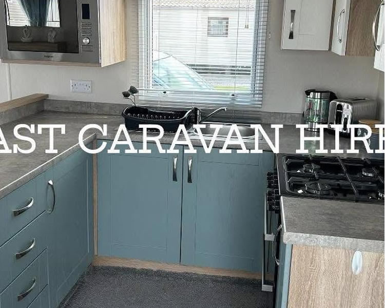 Kitchen and dining area inside Poplars Caravan