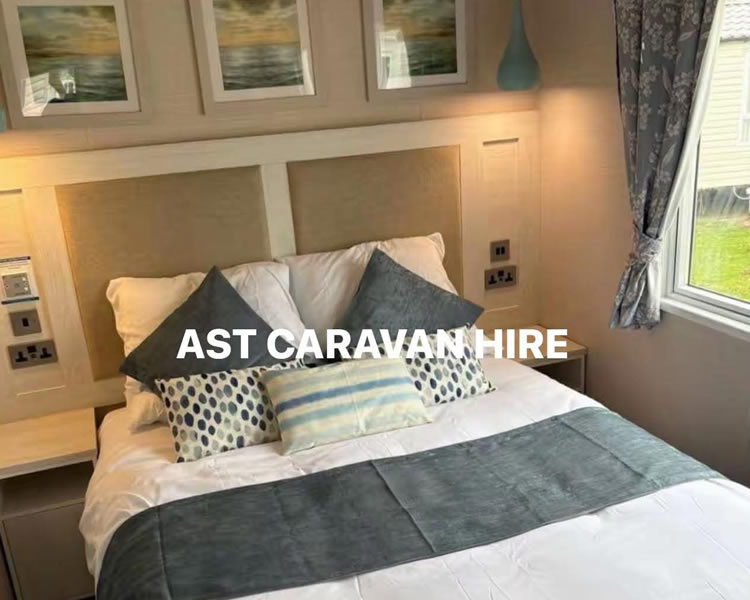 Master bedroom at Preseli Park 7 with television and en-suite