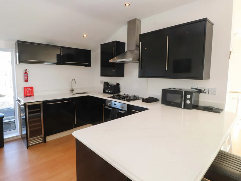 Kitchen and dining area at Sea Breeze Retreat