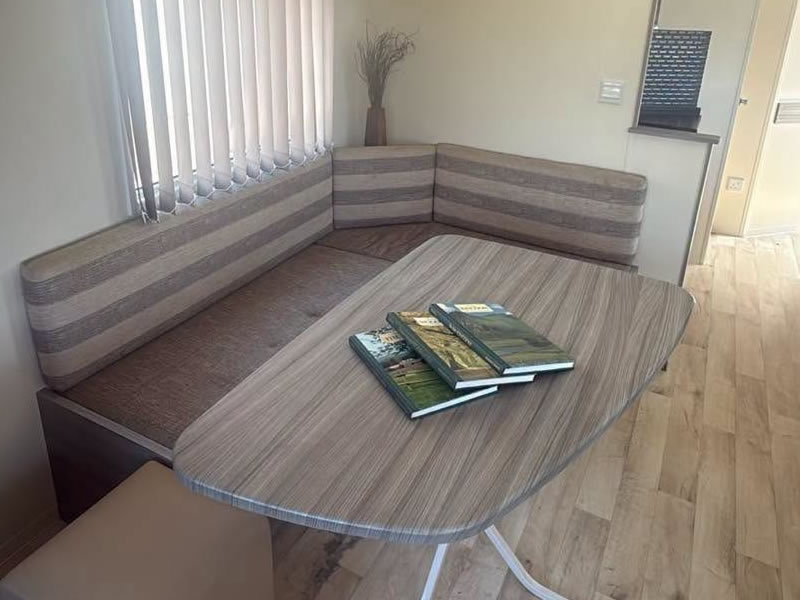 Dining area inside the Criccieth caravan