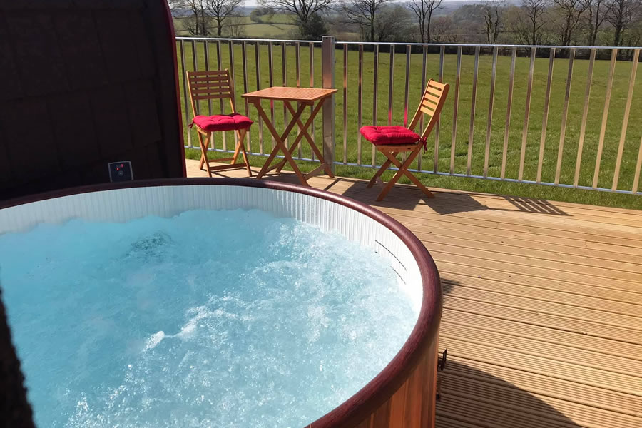 Private hot tub at The Cennen glamping pod