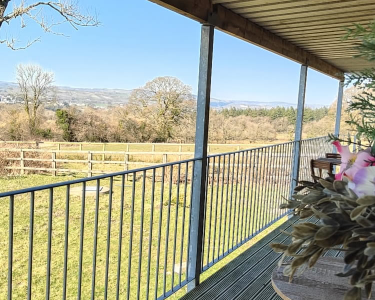 Decking area with countryside views at The Dutchy